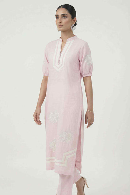 Light pink kurta with embroidered front and matching pants, side view