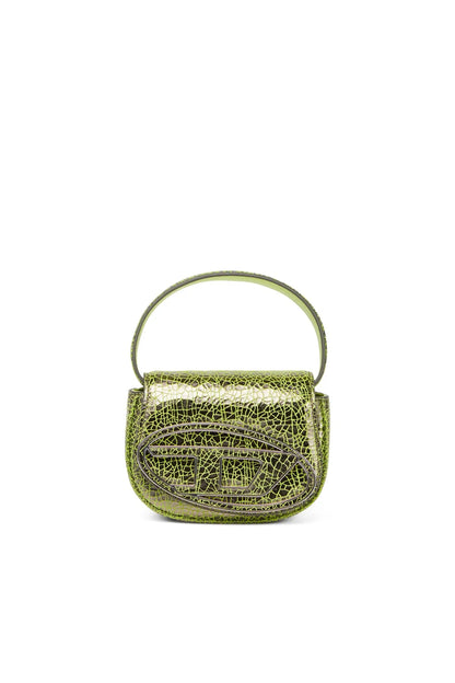 Green textured mini handbag with top handle and flap closure.