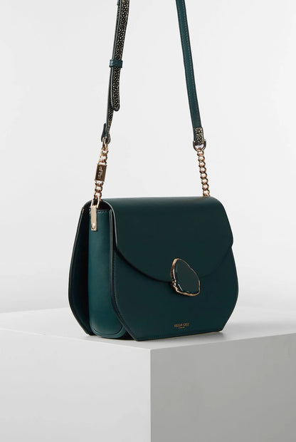 Teal small shoulder bag with flap, long chain strap, and gold-tone hardware