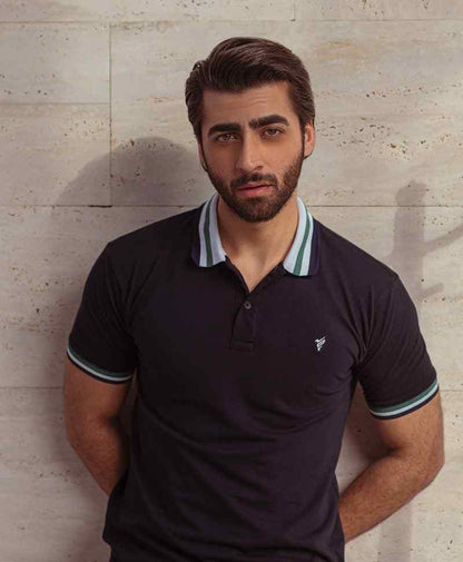 Men's dark polo shirt front close-up, striped collar and short sleeve cuffs