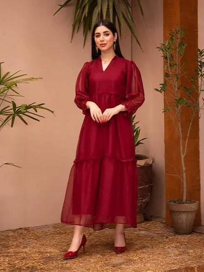 Deep red V-neck tiered midi dress with long sheer sleeves and midi hem, full front.