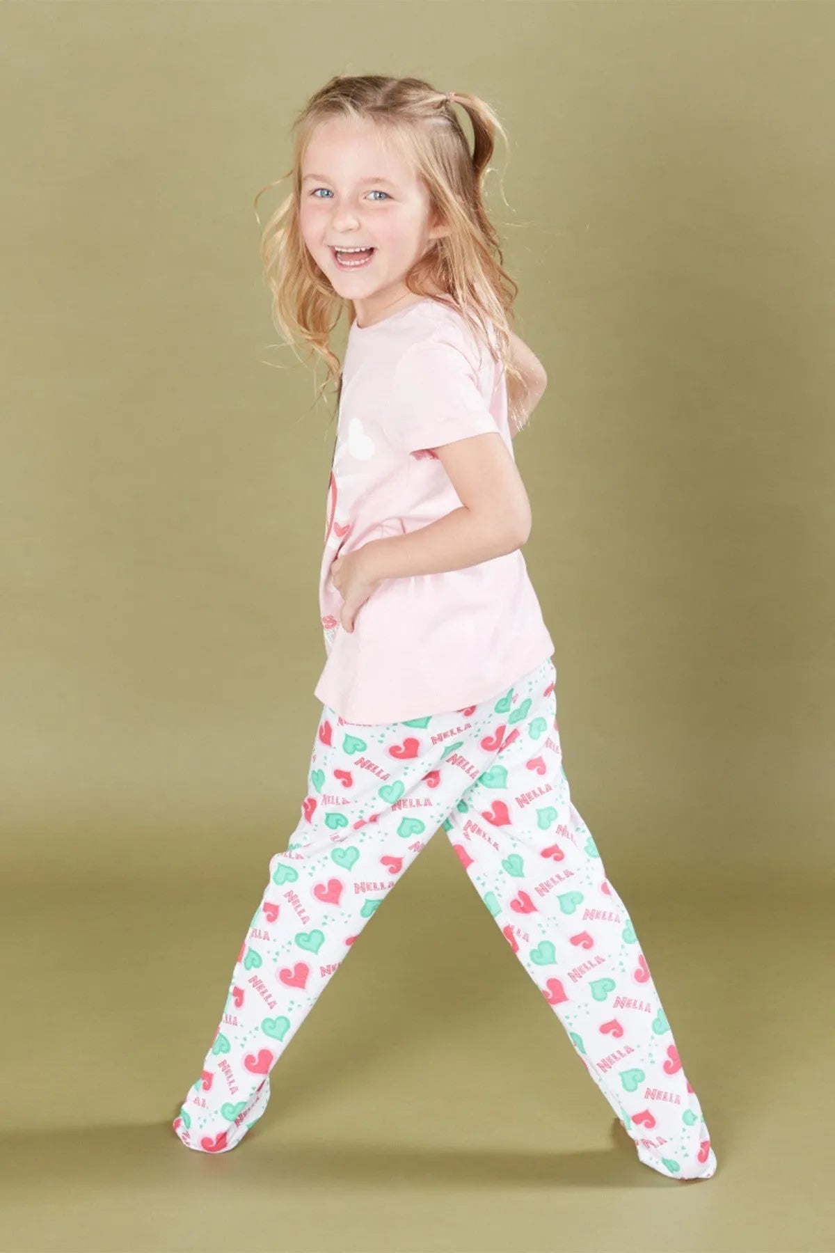 Pink princess graphic tee with teal and heart printed pajama pants