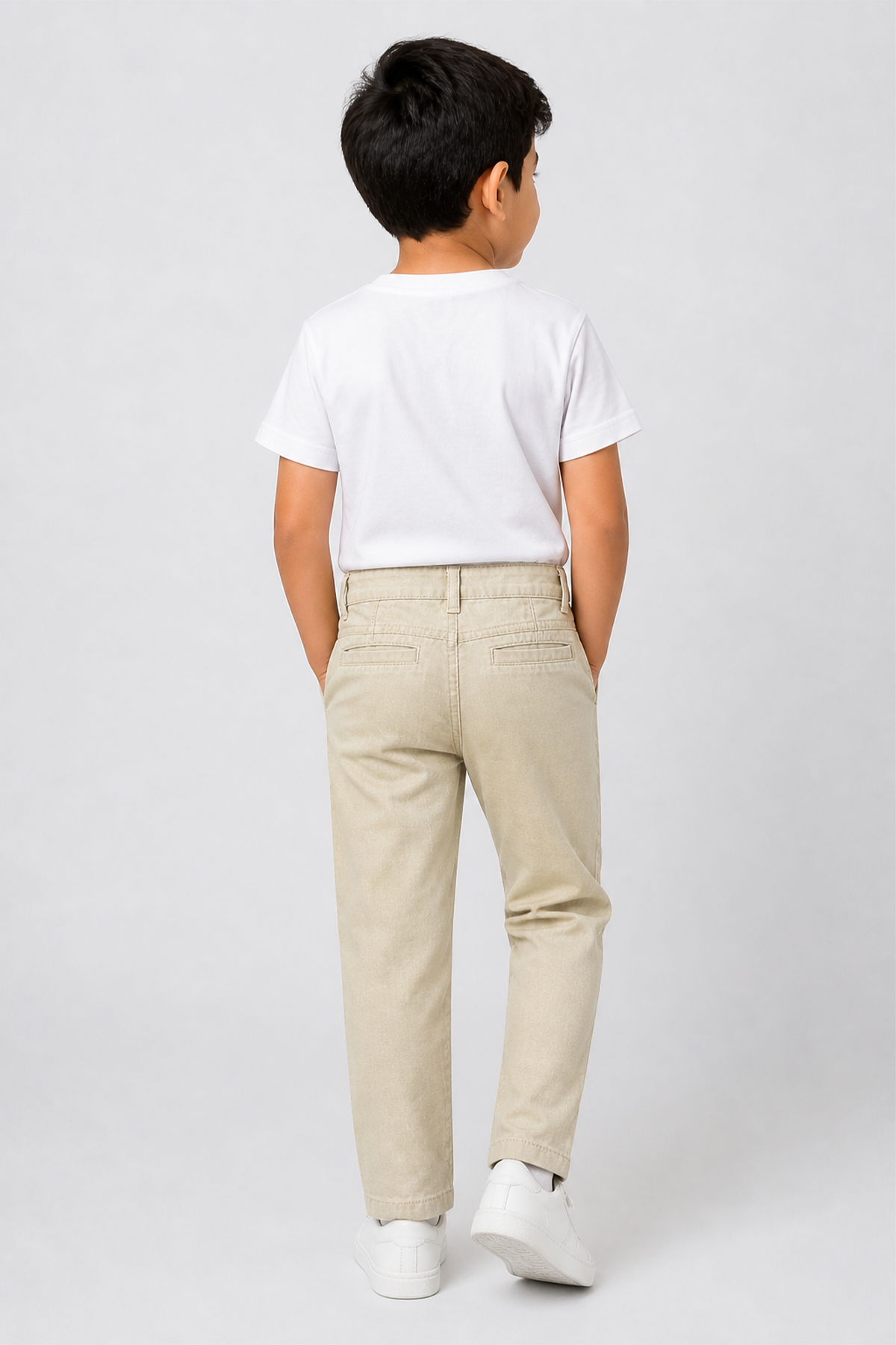 Kids beige trousers from back with belt loops and straight legs
