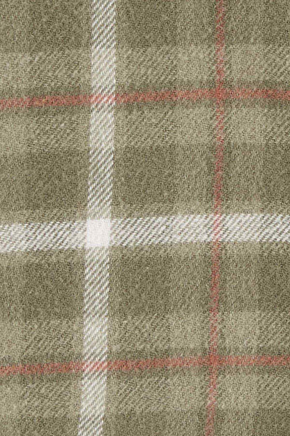Olive plaid fabric close-up with white and rust grid lines