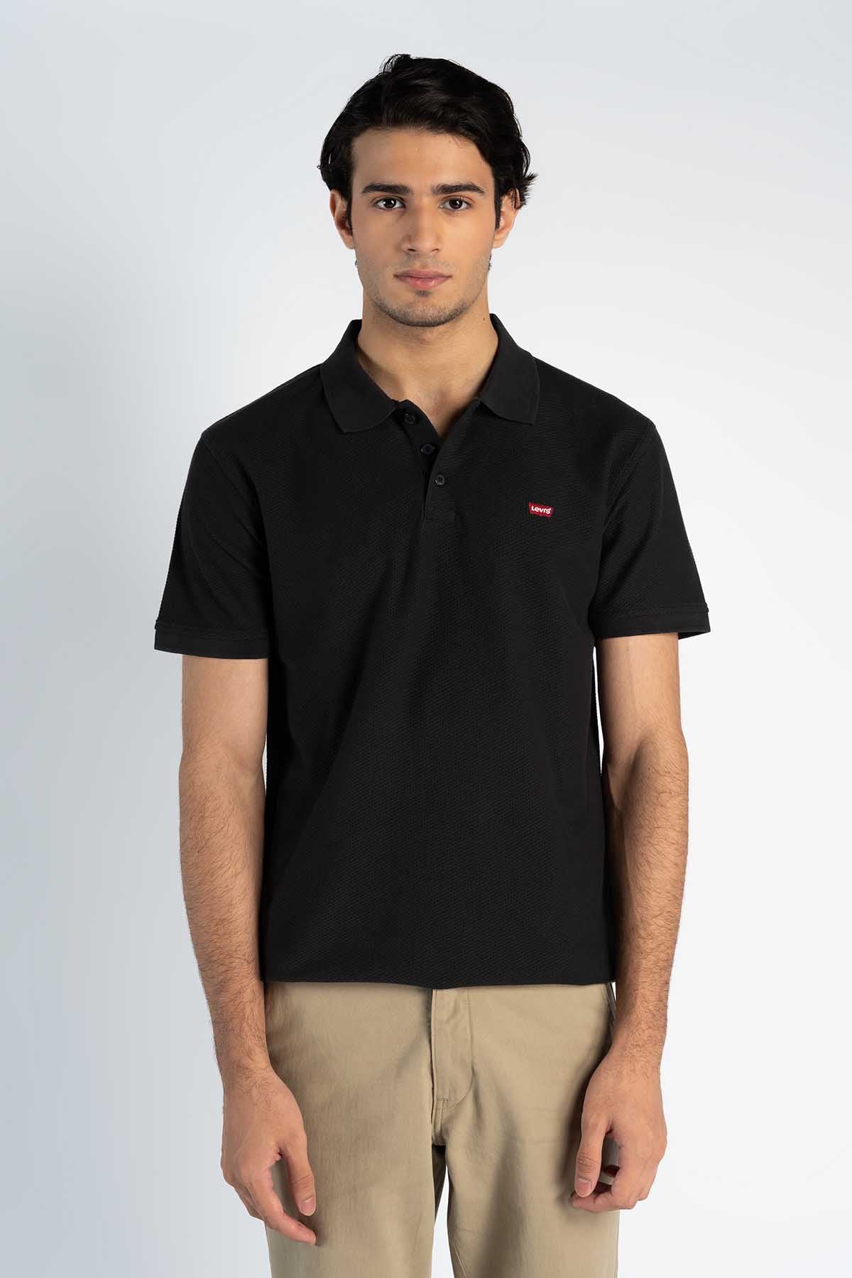 Black polo shirt front with button placket and chest logo