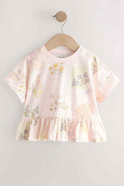 Kids' cream floral peplum T-shirt with gathered waist and short sleeves