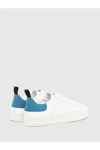 Diesel white sneakers pair with teal cuffs and black heel tabs