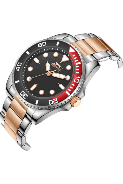Tilted view silver and rose gold wristwatch with black dial, red bezel, and baton markers