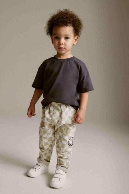 Kids checkered cargo pants with smiley patch, beige and sage, cuffed ankles