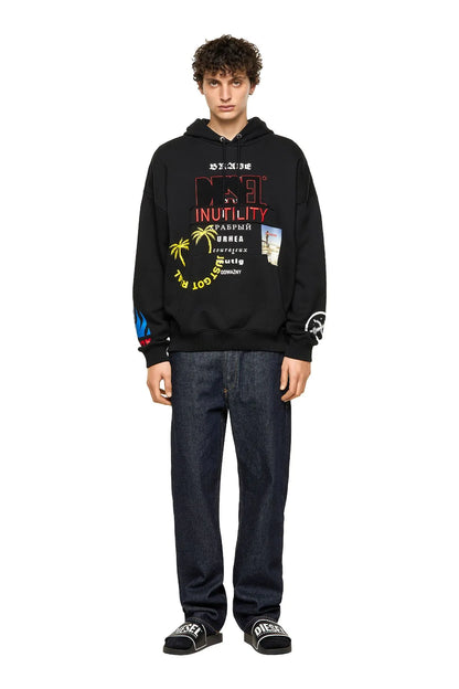 Black Diesel hoodie with front graphic print and ribbed cuffs, paired with jeans