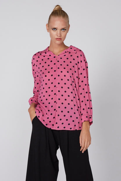 Pink polka-dot blouse with button-front and long sleeves