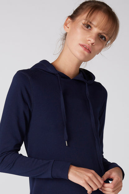 Navy pullover hoodie dress detail: drawstring hood and long sleeves with ribbed cuffs