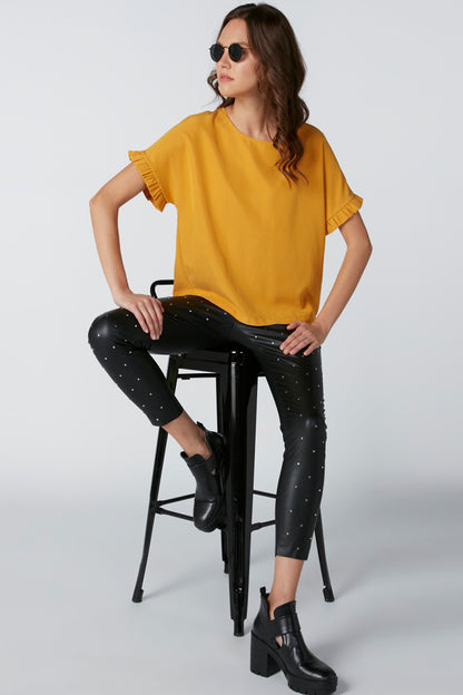 Yellow short-sleeve blouse with ruffled sleeve cuffs and relaxed fit