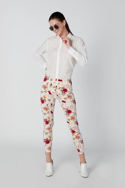White button-up shirt and red floral print pants, full outfit view