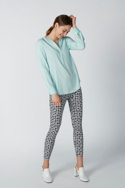 Light aqua long-sleeve button-up blouse with collar and front placket