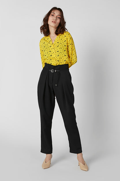 Yellow patterned blouse with V-neck and long sleeves