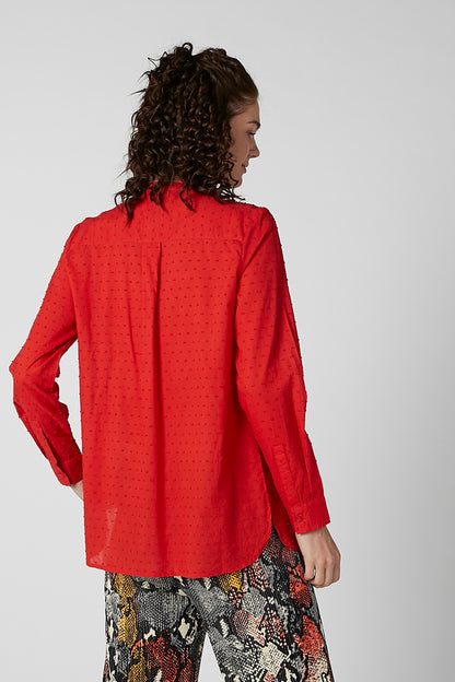 Red long-sleeve button-front blouse, back view with pintuck texture