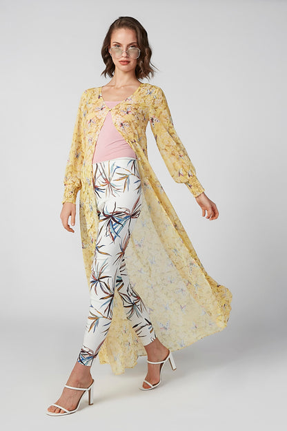 Yellow sheer long robe over pink camisole and tropical floral pants set