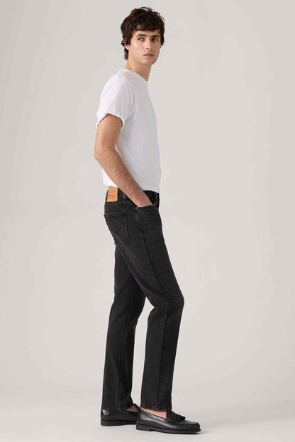 Levi's black denim jeans, side view, straight leg with contrast stitching