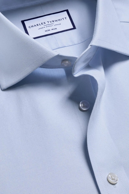 Light blue dress shirt with Charles Tyrwhitt label and buttoned cuff