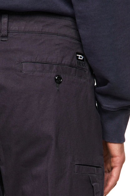 Diesel dark navy trousers close-up: coin pocket, belt loops, logo patch