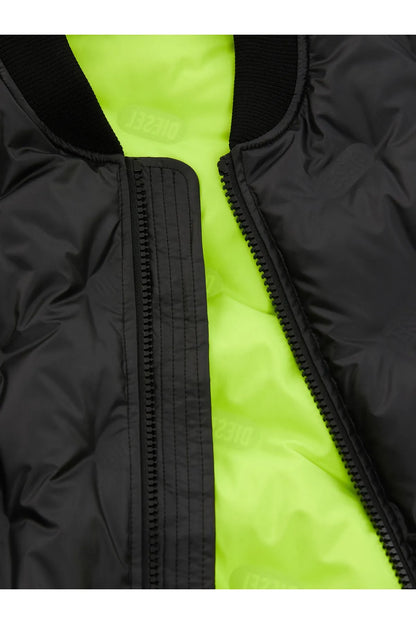 Black puffer jacket with contrasting neon green lining and visible zipper