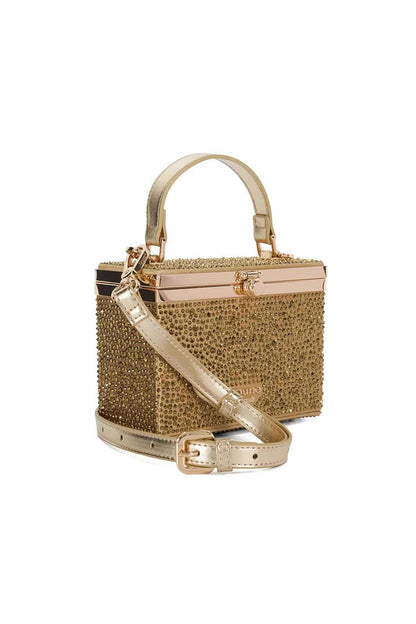 Gold studded handbag with top handles, front clasp, and crossbody strap