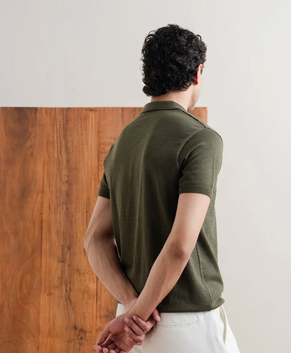 Olive fitted polo shirt with short sleeves and straight back view hem