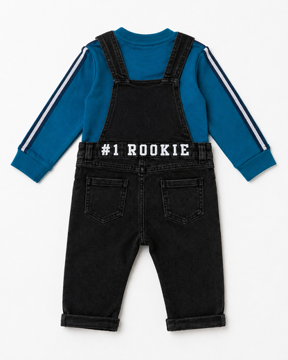 Black denim overalls with #1 ROOKIE graphic and blue striped sleeves, front