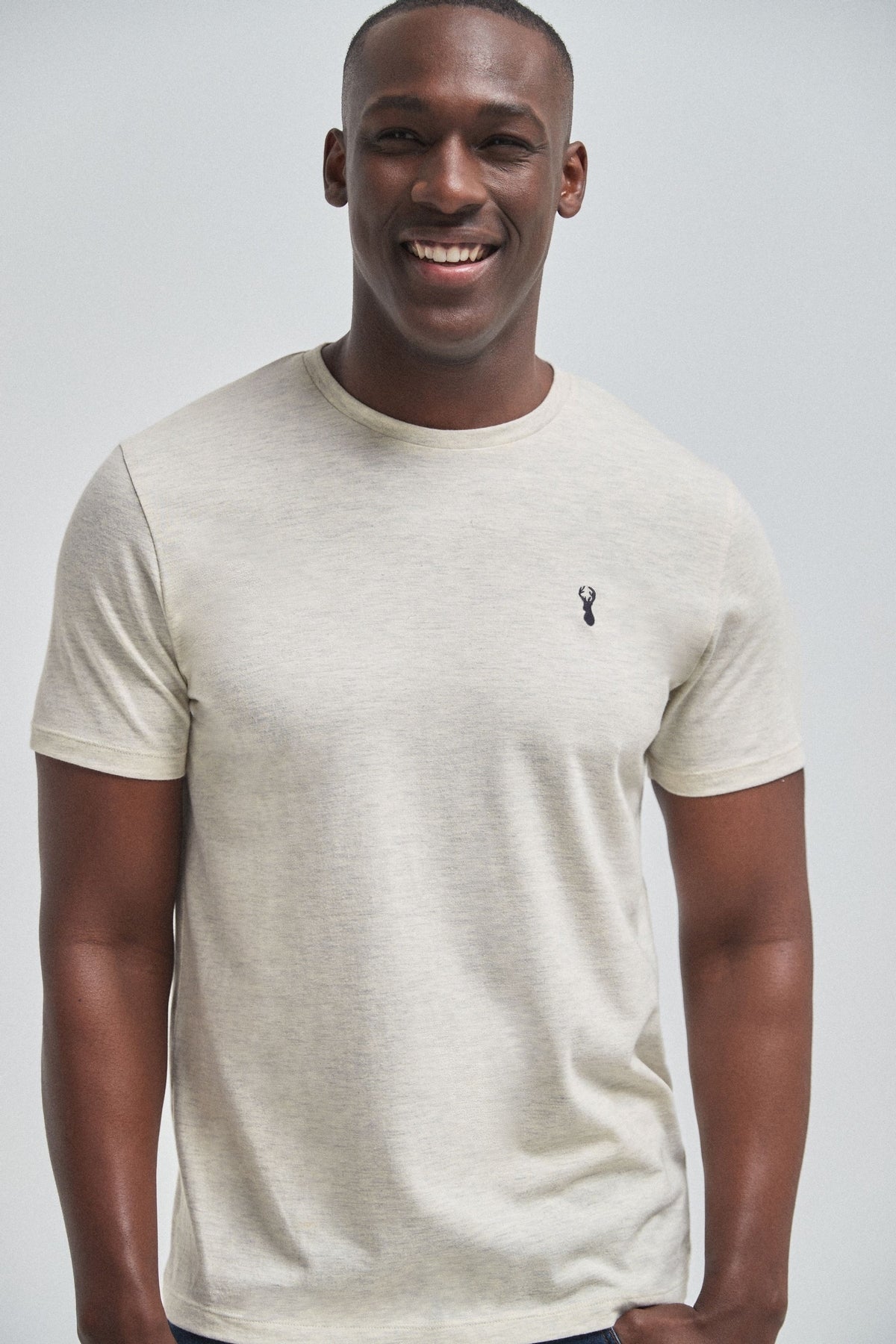 Cream short-sleeve T-shirt with small chest logo