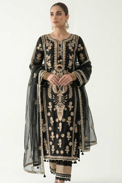 Black kurta set with gold embroidery, sheer sleeve overlay, tasselled dupatta edge