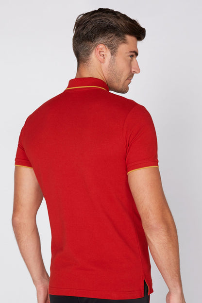 Red polo shirt back view with gold-trim collar and short sleeves