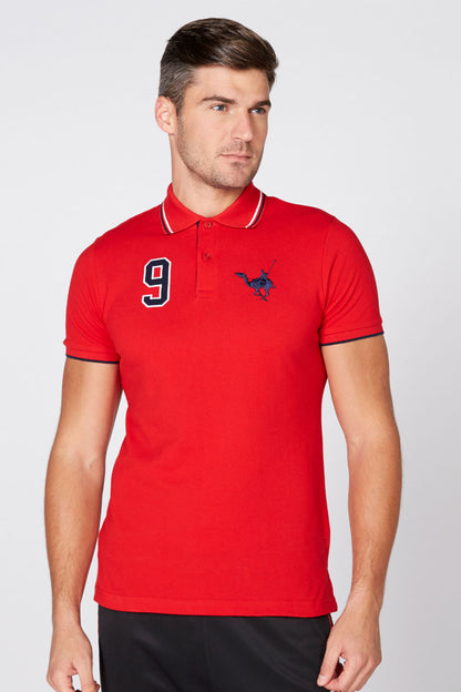 Red short-sleeve polo shirt with collar, number 9 graphic, and chest logo