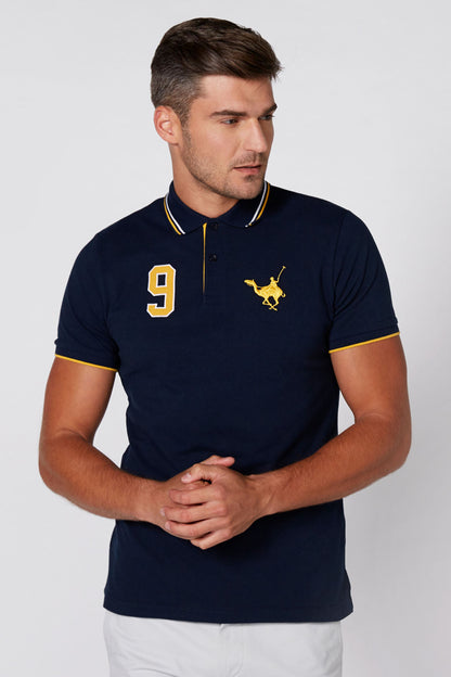 Navy short-sleeve polo with yellow trim, number 9, and small horse logo