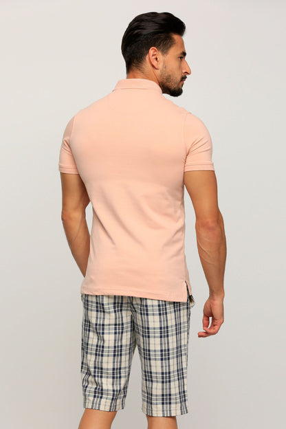 Men's pink polo shirt with plaid shorts, back view, collar and straight hem