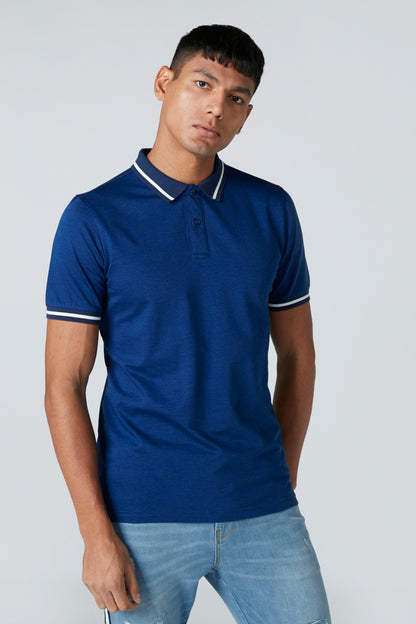 Blue polo shirt with white-trim collar and sleeve cuffs, button placket.