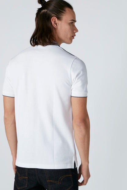 White short-sleeve polo shirt with striped collar, back view with seam detail