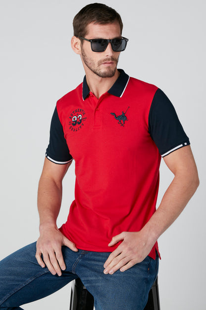 Red polo shirt with dark navy sleeves, collar trim, and chest logo