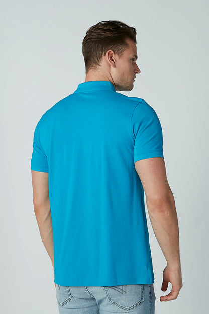 Blue polo shirt with collar and short sleeves, back view