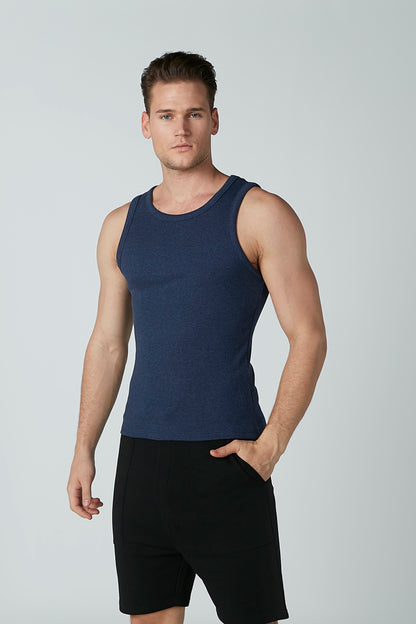 Navy sleeveless tank top with crew neck and straight hem, worn with black shorts