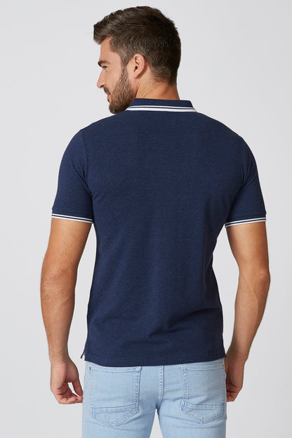 Navy polo shirt back view with white striped collar and sleeve cuffs