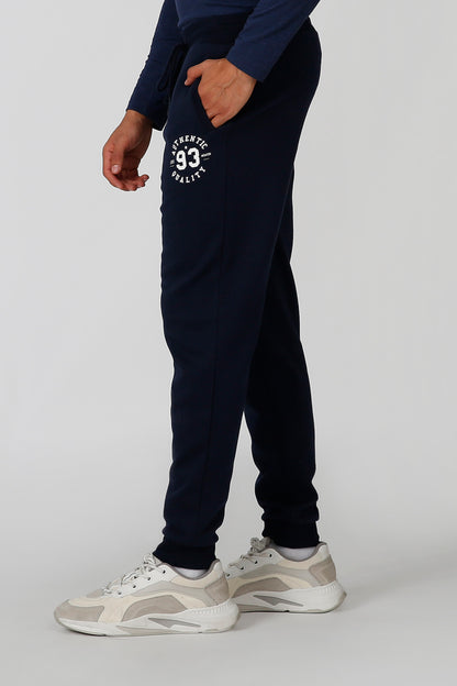 Navy jogger sweatpants with side logo patch and drawstring waistband