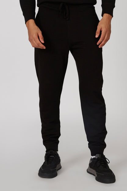 Black jogger pants with drawstring waist and elastic ankle cuffs