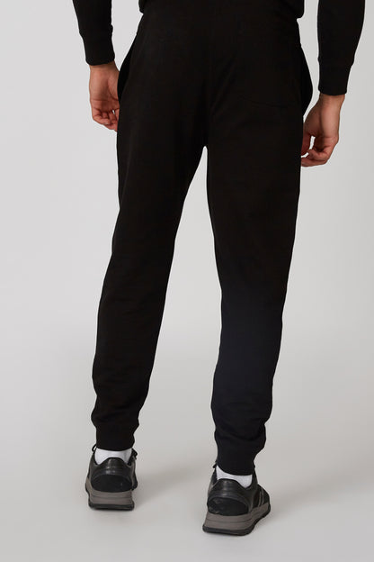 Black jogger pants with tapered fit and elastic ankle cuffs