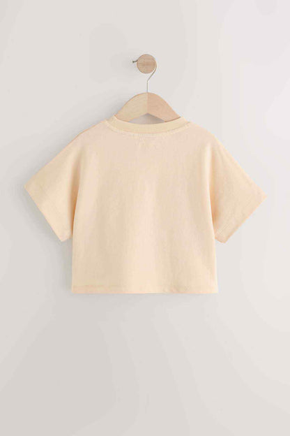 Ecru kids T-shirt back view on wooden hanger, short sleeves