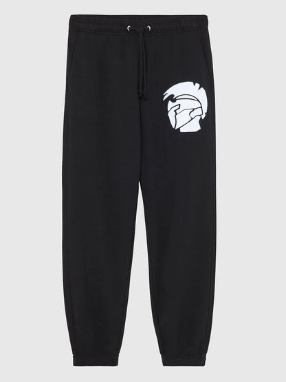 Black logo track pants with drawstring waist and large white emblem on thigh