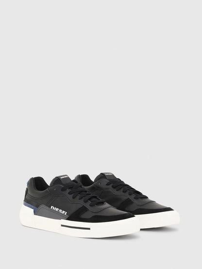 Black Diesel low-top sneakers, front three-quarter view with blue stripe and logo