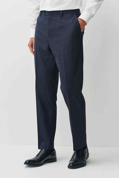 Navy suit trousers with crease and belt loops, worn with black shoes