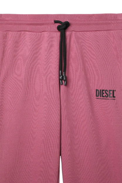 Pink jogger pants close-up: elastic waistband, black drawstring, Diesel logo