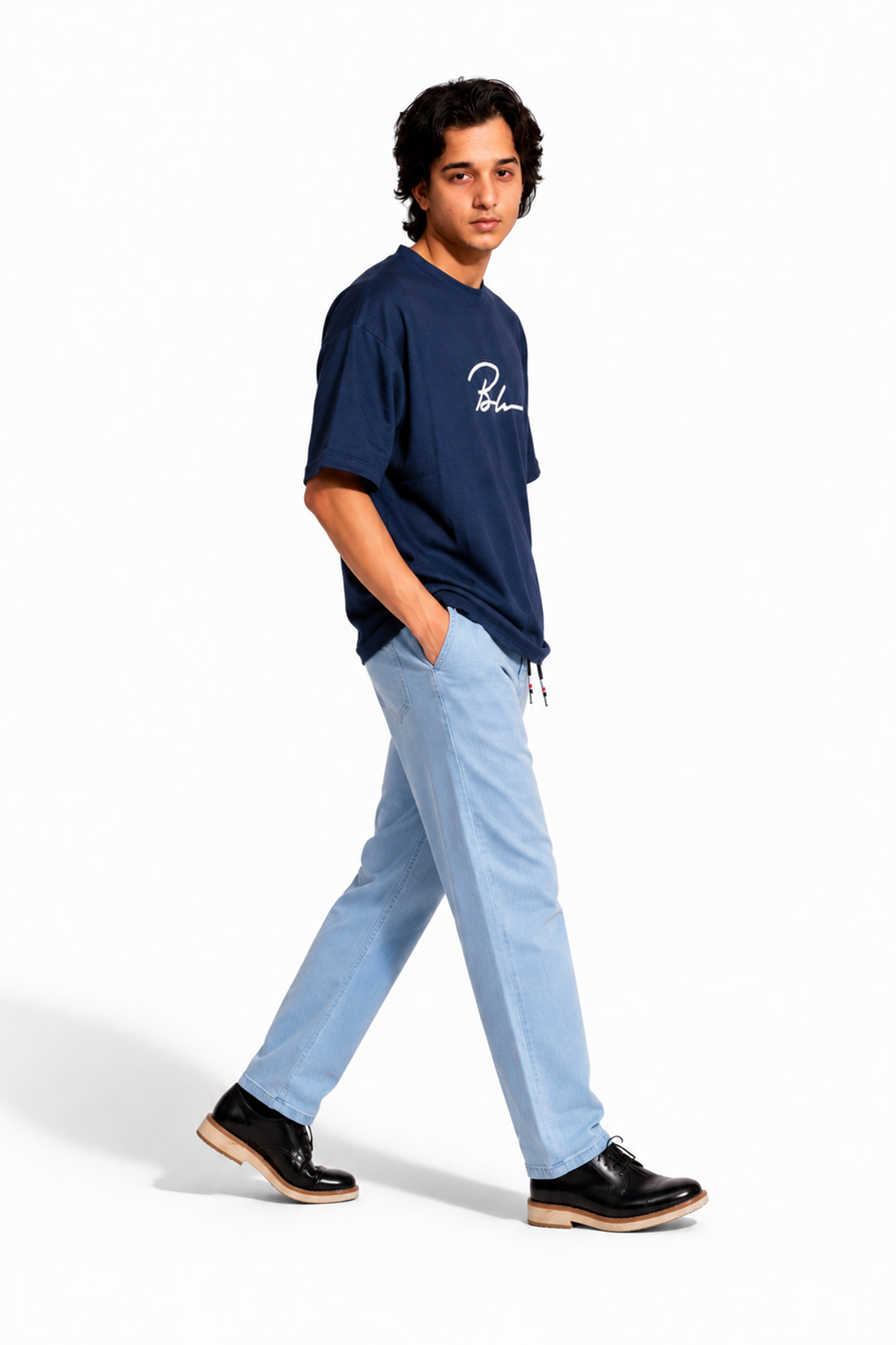Beleri London Ice Blue drawstring jeans, light denim, side view; worn with sneakers